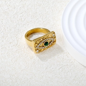 18k gold plated stainless steel evil eye ring with green stone and hammered texture