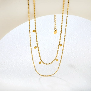 Collar de doble capa de acero inoxidable chapado en oro de 18K con cadena de cuentas y colgantes