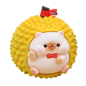 Cute white animal piggy bank wearing yellow durian shell with red bow and Suki flag