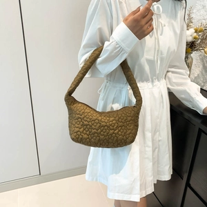 Quilted olive green half-moon shoulder bag with textured floral embroidery pattern