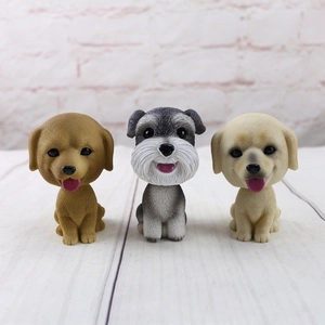 Three cute shaking head dog car dashboard ornaments including Schnauzer and Golden Retriever