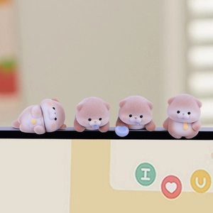 Set of four cute flocked otter and fish figures for computer monitor and desk decor