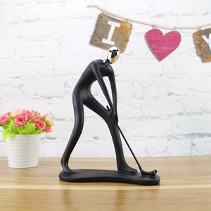 Modern resin golf player sculpture with matte black body and silver head in swing pose