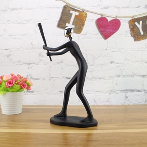 Modern resin sports sculpture of a baseball player with matte black and silver finish