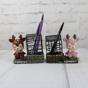 Cartoon deer pen holder with black metal mesh and forest base in pink and brown