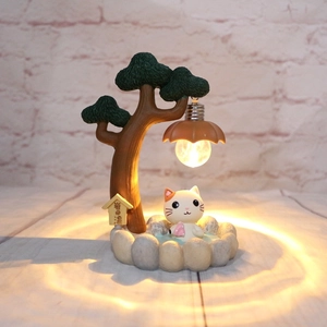 Cozy Japanese cat hot spring night light with soft warm LED glow and resin details