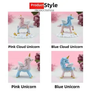 Detail showing four styles of resin unicorn cake toppers with gold horns and glitter wings