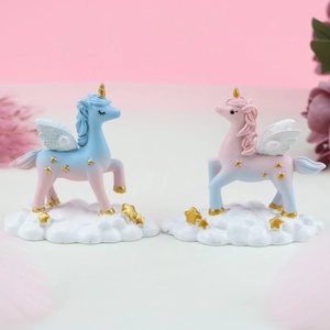 Pair of dream unicorn resin figurines with golden horns and cloud base for cake decor