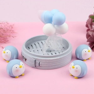 Miniature blue penguins set with small balloon steamer for cute desktop decor