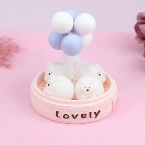 Cute bunny in pink steamer base with blue balloons desktop ornament for car or cake decoration