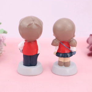 Rear view of cute cartoon doll cake ornaments for students in new Chinese style