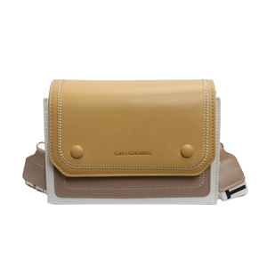 Modern tricolor crossbody square bag with yellow flap and geometric wide strap
