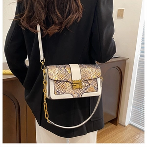 Chic small square crossbody bag with snake print detail and vintage gold lock