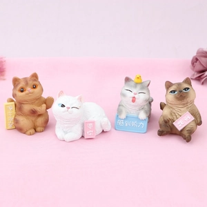 Detailed set of four cute cartoon resin cat figurines with thematic Chinese signs