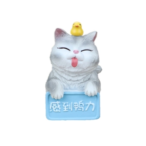 Creative gray tabby cat figurine with yellow duckling for cake and car dashboard