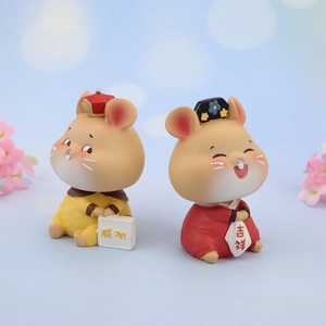 Macro view of Chinese style resin mouse ornaments with Good Luck and Success characters