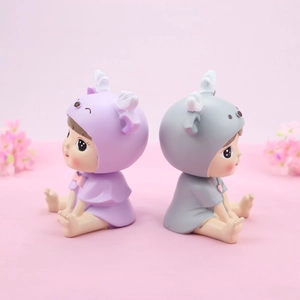 Cute resin baby figurines in purple and grey hoods for cake toppers or car decor