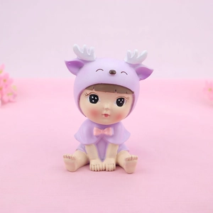 Cute cartoon deer figurine in purple reindeer onesie for cake topper or car decor