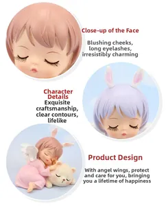 Close-up of exquisite facial details on cute angel girl resin cake topper with wings