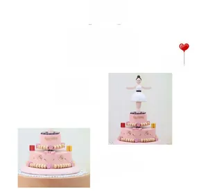 Detail of pink wooden music box with ballerina and Happy Birthday engraving