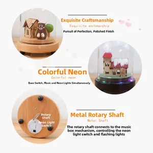 Detail of wooden music box showing LED lights, rotating base and micro landscape scenery