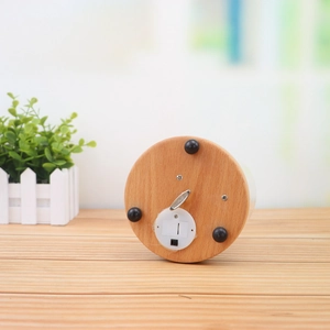 Creative wooden music box base with non-slip feet, metal winder, and battery compartment
