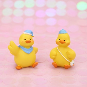 Cute yellow resin duck figurines set with blue sleep caps for desk or car decoration