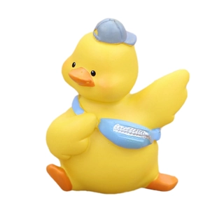 Cute yellow duck ornament with blue hat and cross-body bag for car or desk decor