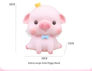 Tirelire cochon rose extra large avec couronne et ailes dimensions montrant 26cm x 28cm