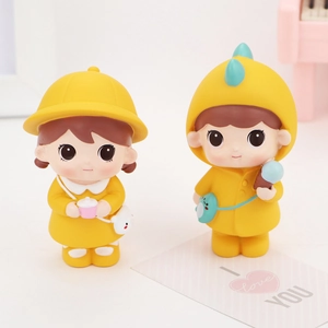 Cute resin girl figurines in yellow outfits for car dashboard and desk decoration
