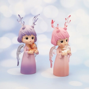 Detailed view of dreamy angel figurines with deer and bunny for car or room decor