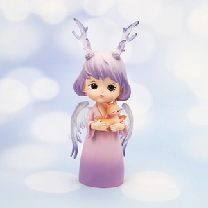 Close-up of dreamy purple antler girl figurine holding a fawn for home and car decor