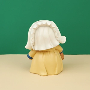 Detailed back view of a Nordic resin girl figurine in yellow dress for home storage