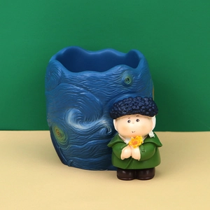 Close-up of Van Gogh themed blue desk organizer with 3D Starry Night textures