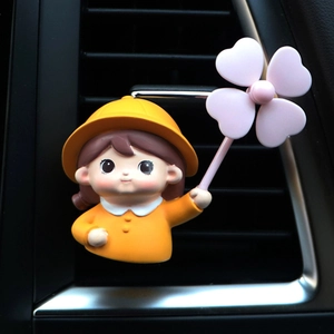 Cute cartoon girl car air vent aromatherapy clip in yellow raincoat ornament