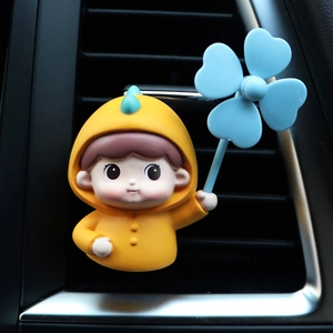 Cute boy in yellow dinosaur hoodie car air vent decor with rotating blue windmill clover