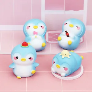 Miniature penguin desk ornaments set with cute accessories in a cozy scene