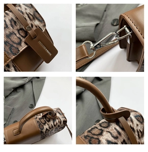 Close-up of leopard print handbag detailing, gold hardware, and sturdy handles