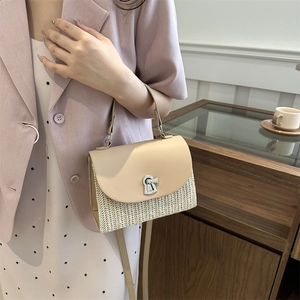 Chic straw woven crossbody bag with contrast leather flap and keyhole metal lock