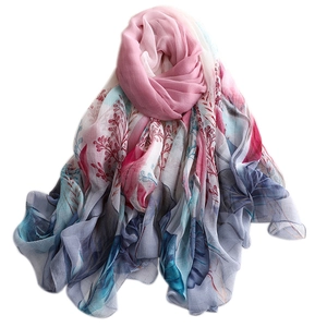 Elegant autumn silk scarf with colorful floral print and lightweight chiffon gradient texture
