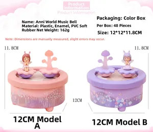 Detailed view of pink and purple Annie World rotating music boxes with size specifications