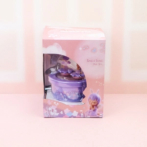 Pink dreamy Anne's World musical box with unicorn figurine in a gift box packaging