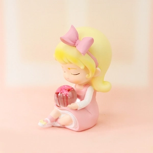 Close-up of a cute cartoon girl night light with pink flowers in a glass globe