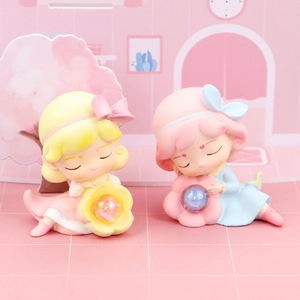 Cute dream-themed night light ornaments featuring sleeping girl figures on a desk