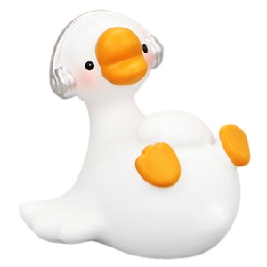 Cute white goose ornament with silver headphones for car interior and desk decor