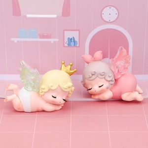 Décoration de gâteau bébés anges endormis avec couronne dorée et nœud rose mignon