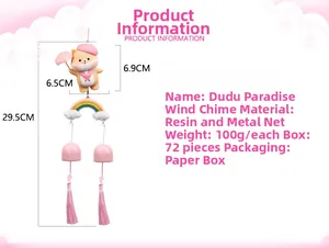 Detail of pink cartoon animal wind chime with vinyl doll, metal bells and silk tassels