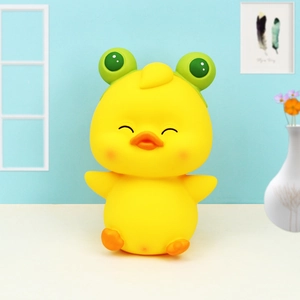 Niedliche gelbe Enten-Spardose mit grünem Froschhut aus weichem Vinyl für Kinder