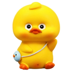 Cute yellow duck car dashboard ornament with a blue crossbody bag on white background