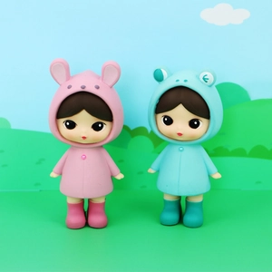 Cute pink rabbit and blue frog rain doll figurines with hand-painted cartoon background